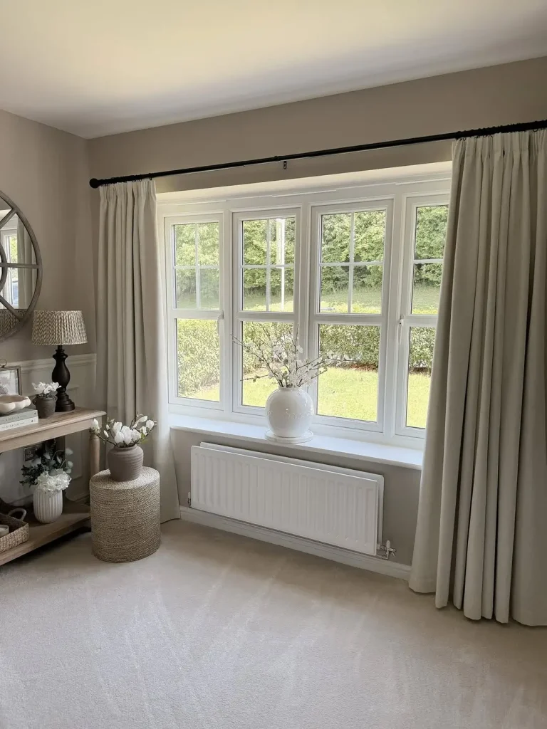 12. Grey Bedrooms with Natural Fabric Curtains