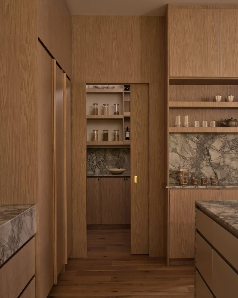 11. Zone Your Kitchen with Tall Pantry Cabinets