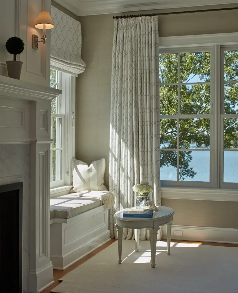 9. The Bay Window Solution: Custom Pinch-Pleat Curved Rod