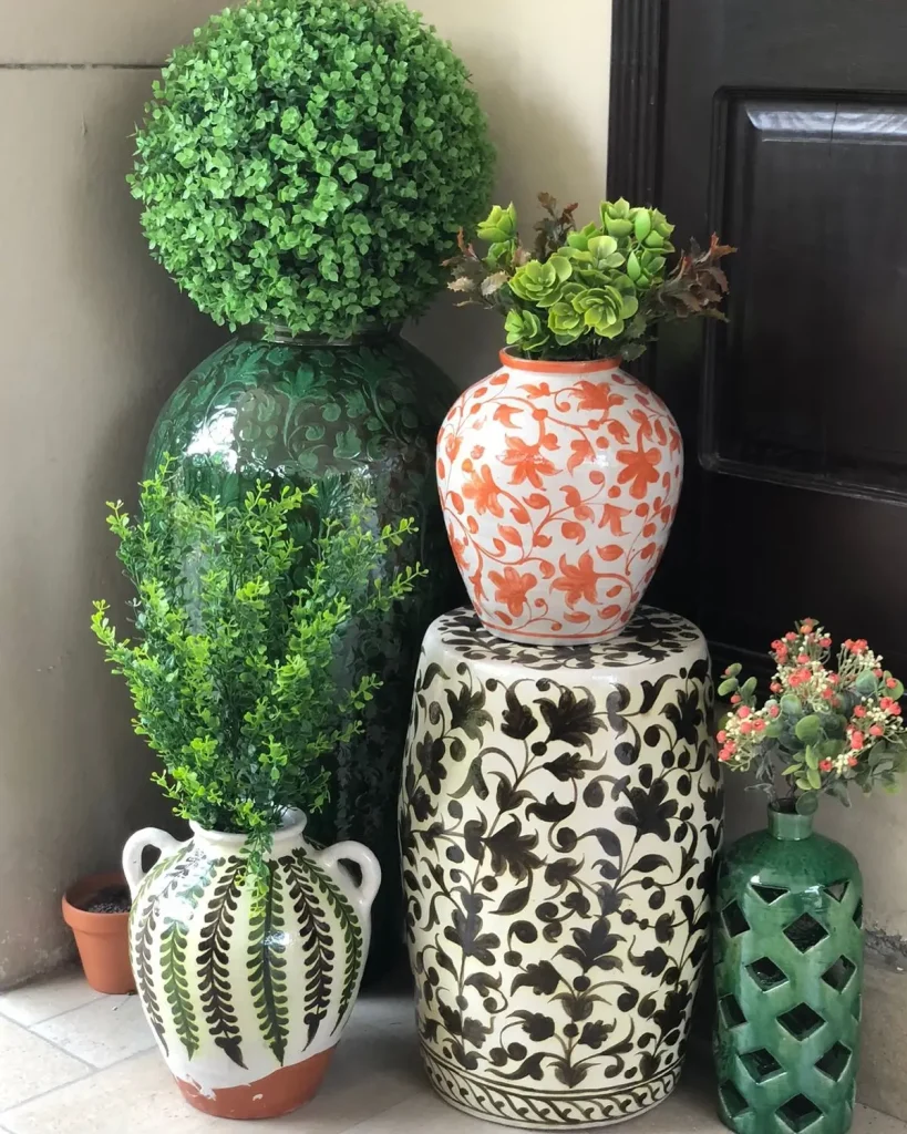 Group African Ceramics and Handcrafted Pottery with Small Plants